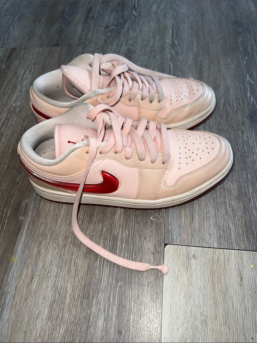 Jordan Low-Top Sneakers in Pink with Red Swoosh